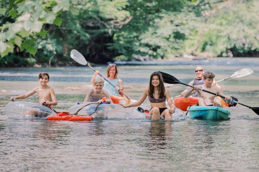 a family rafting and kayaking